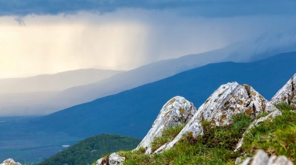 Scenic photo of rain in mountains.